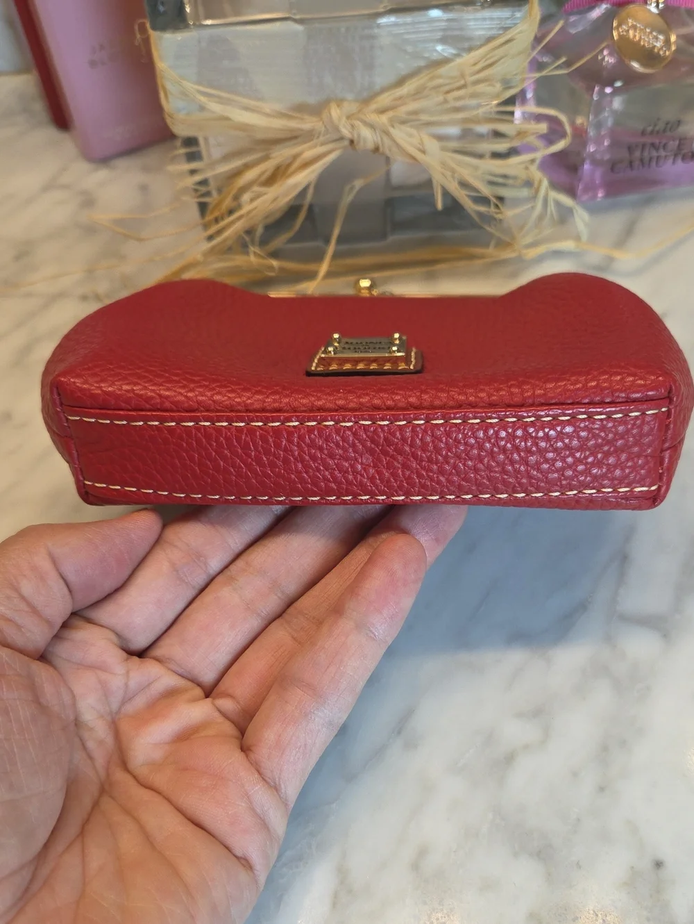 EUC Dooney & Bourke Red Pebbled Leather Kiss-Lock Coin Purse with Gold Plaque